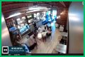 Four masked individuals remove Israeli flags at a Philadelphia cafe. - SarkariResult
